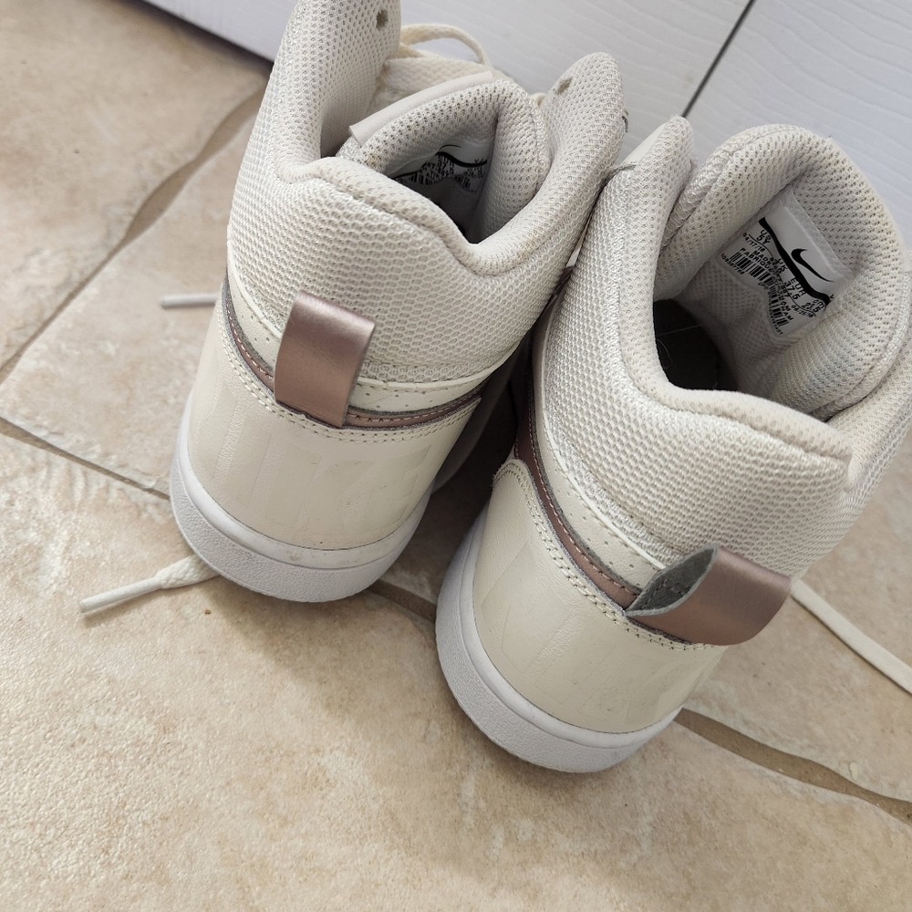 White Nike high tops